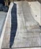 This is the flattened slab.  The lines are from the router.  Lots of sanding now to get them out.  But the slab is now flat both sides - progress.
